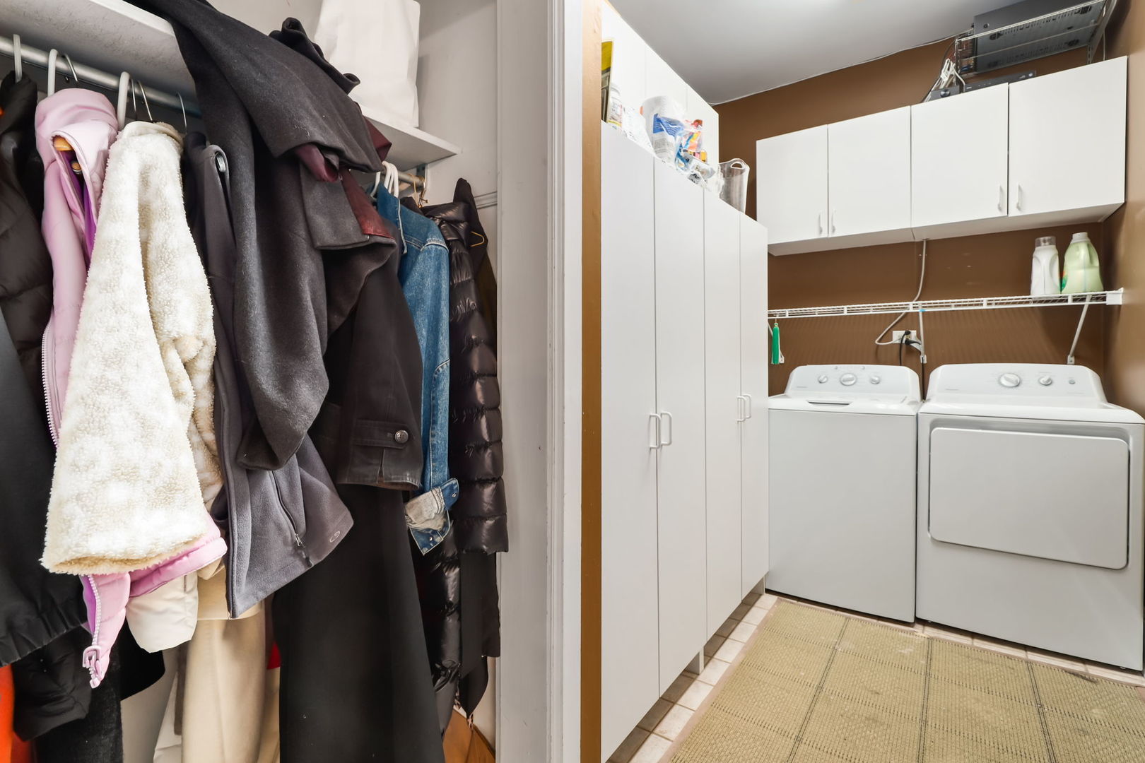 4232 North Tripp Avenue Chicago, IL 60641 - Photo 20 of 46 a view of walk in closet with clothes and shoes