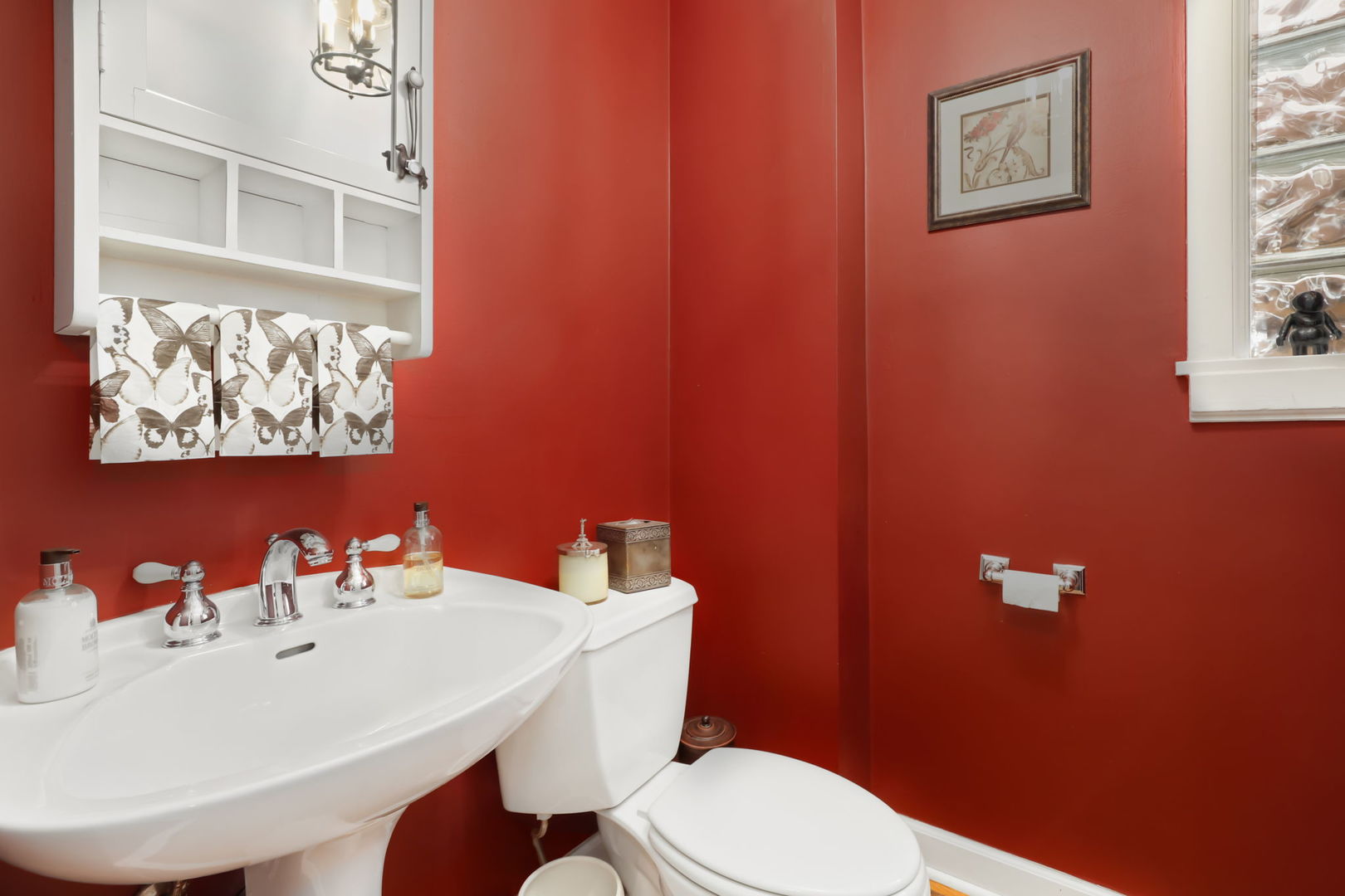 4232 North Tripp Avenue Chicago, IL 60641 - Photo 21 of 46 a bathroom with a sink a toilet and mirror