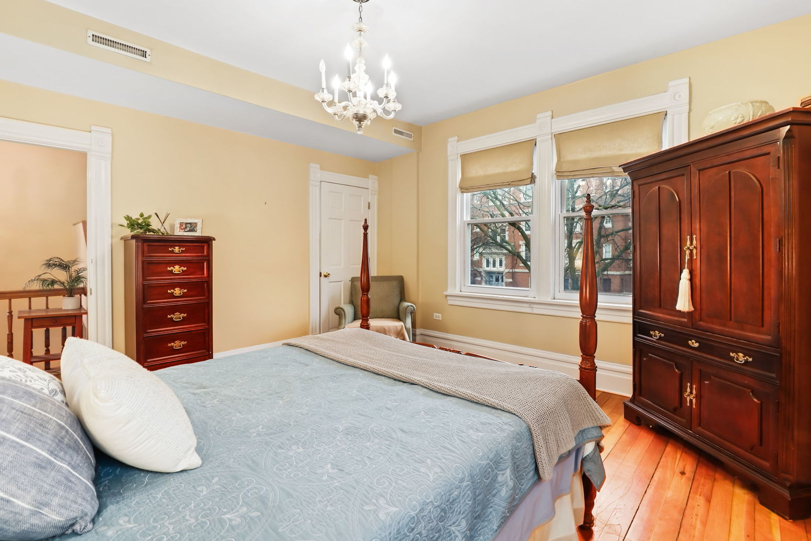 4232 North Tripp Avenue Chicago, IL 60641 - Photo 27 of 46 a bedroom with a bed and a dresser