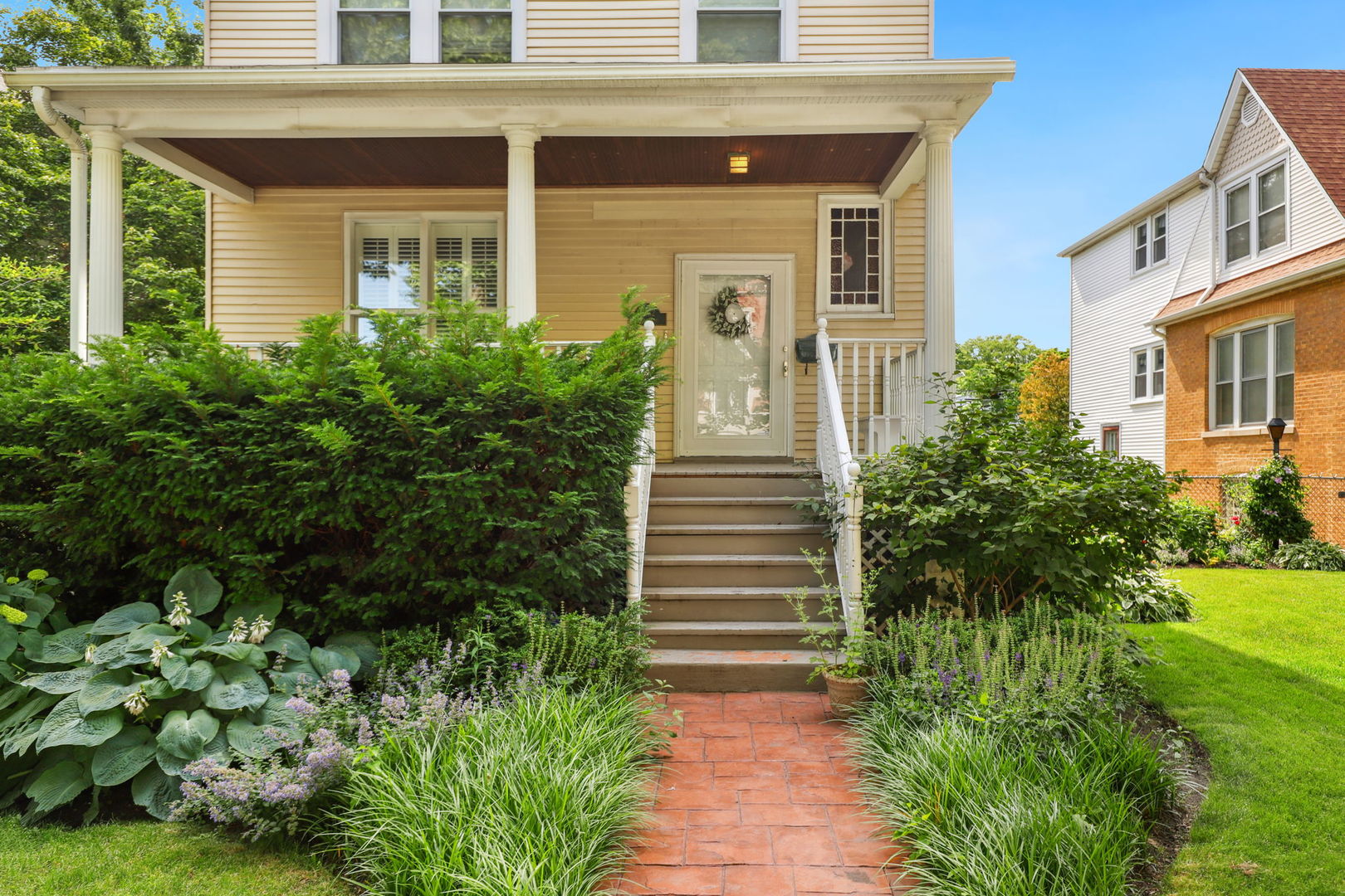 4232 North Tripp Avenue Chicago, IL 60641 - Photo 3 of 46 front view of a house with a yard
