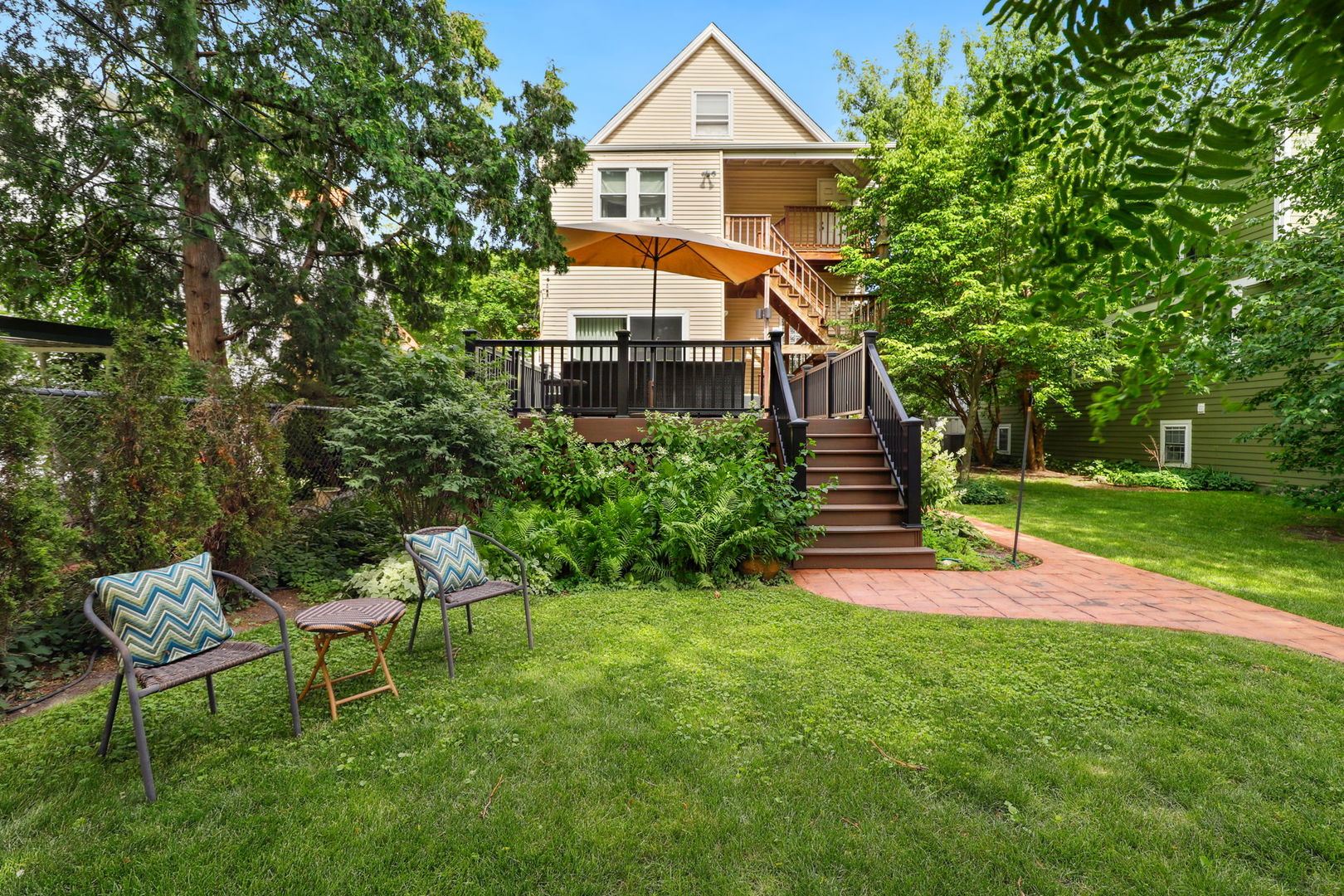 4232 North Tripp Avenue Chicago, IL 60641 - Photo 34 of 46 a house view with a garden space