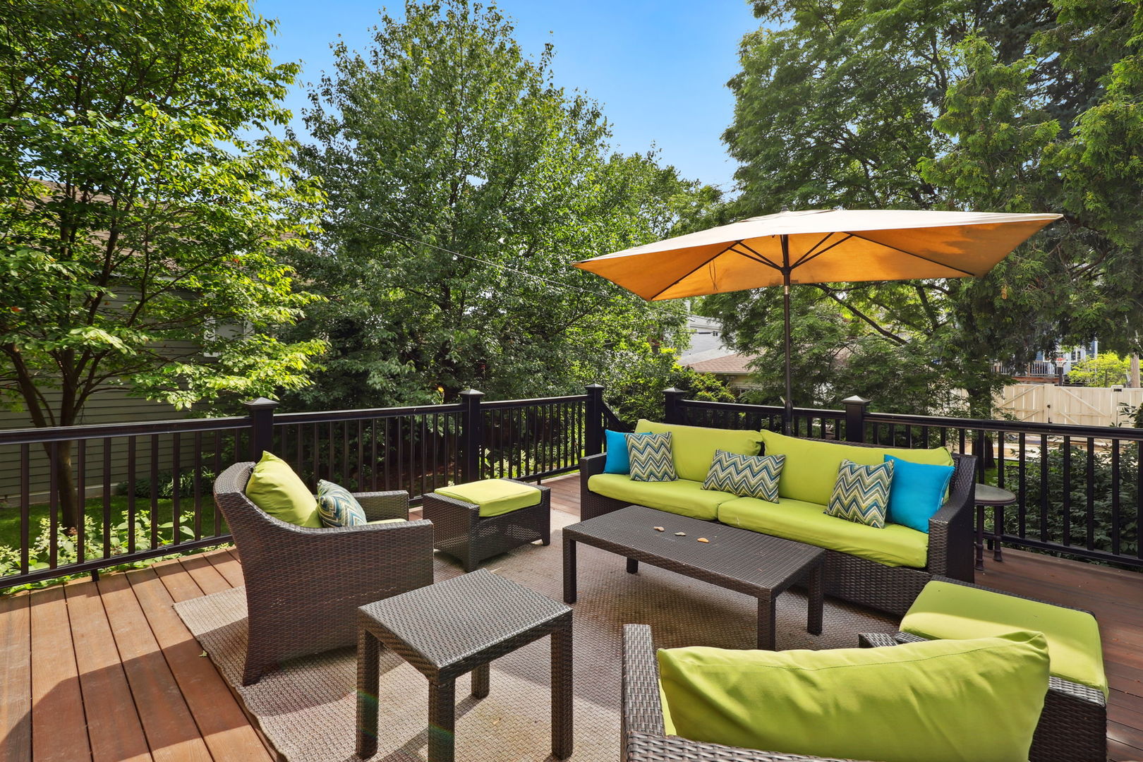 4232 North Tripp Avenue Chicago, IL 60641 - Photo 36 of 46 an outdoor sitting area with furniture and umbrella