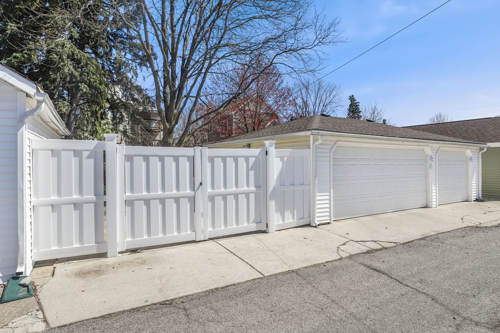 4232 North Tripp Avenue Chicago, IL 60641 - Photo 42 of 46 a view of a house with a wooden fence