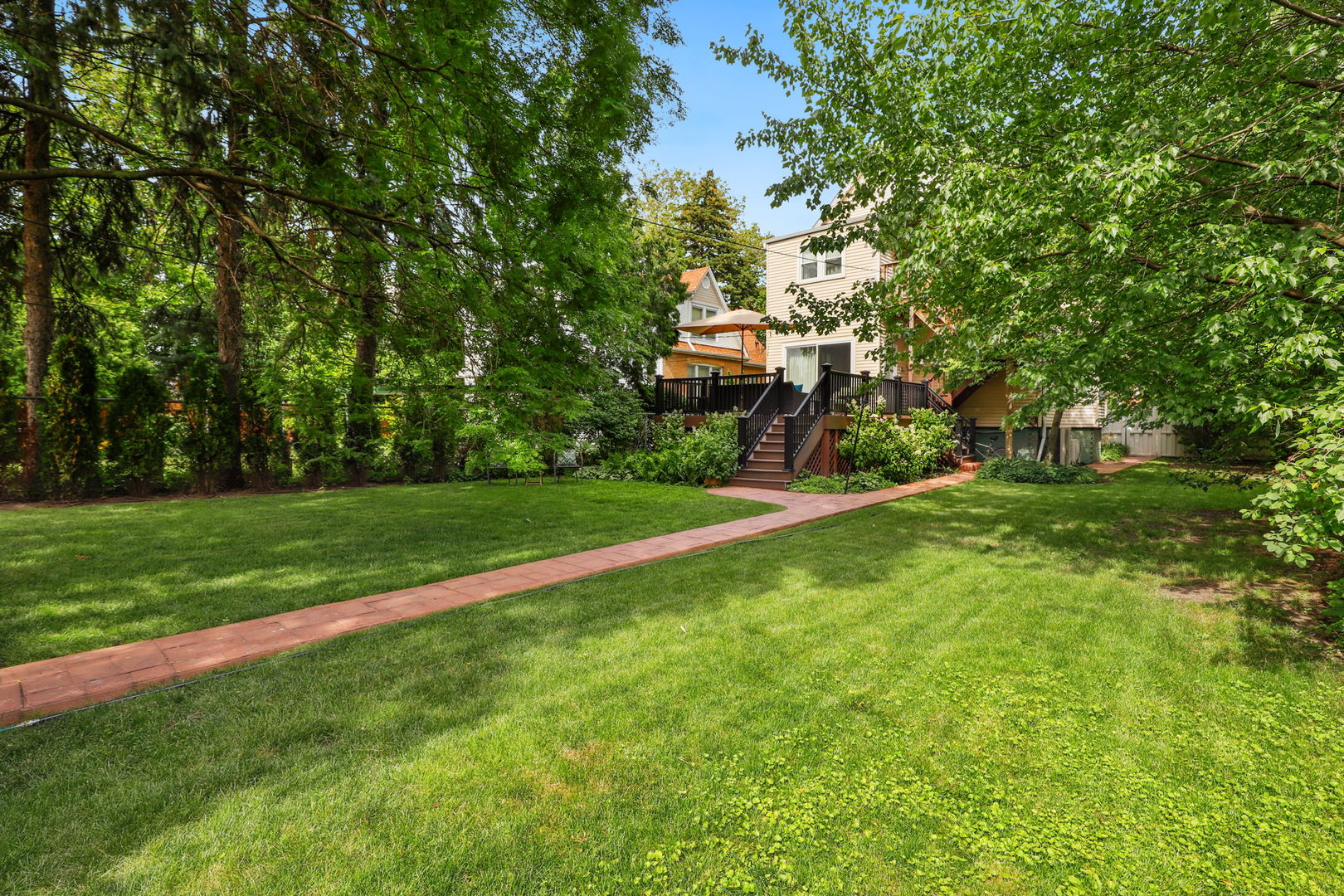 4232 North Tripp Avenue Chicago, IL 60641 - Photo 5 of 46 a view of a house with a yard
