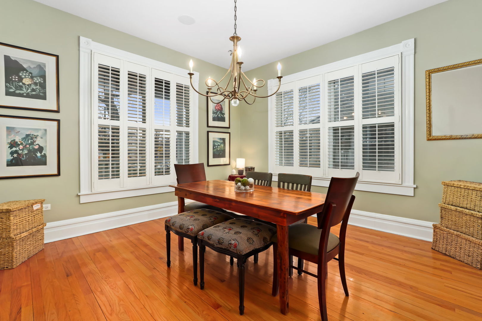 4232 North Tripp Avenue Chicago, IL 60641 - Photo 10 of 46 a dining room with furniture a chandelier and wooden floor