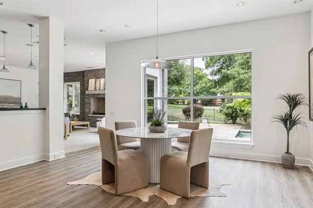 a dining room with furniture window wooden floor