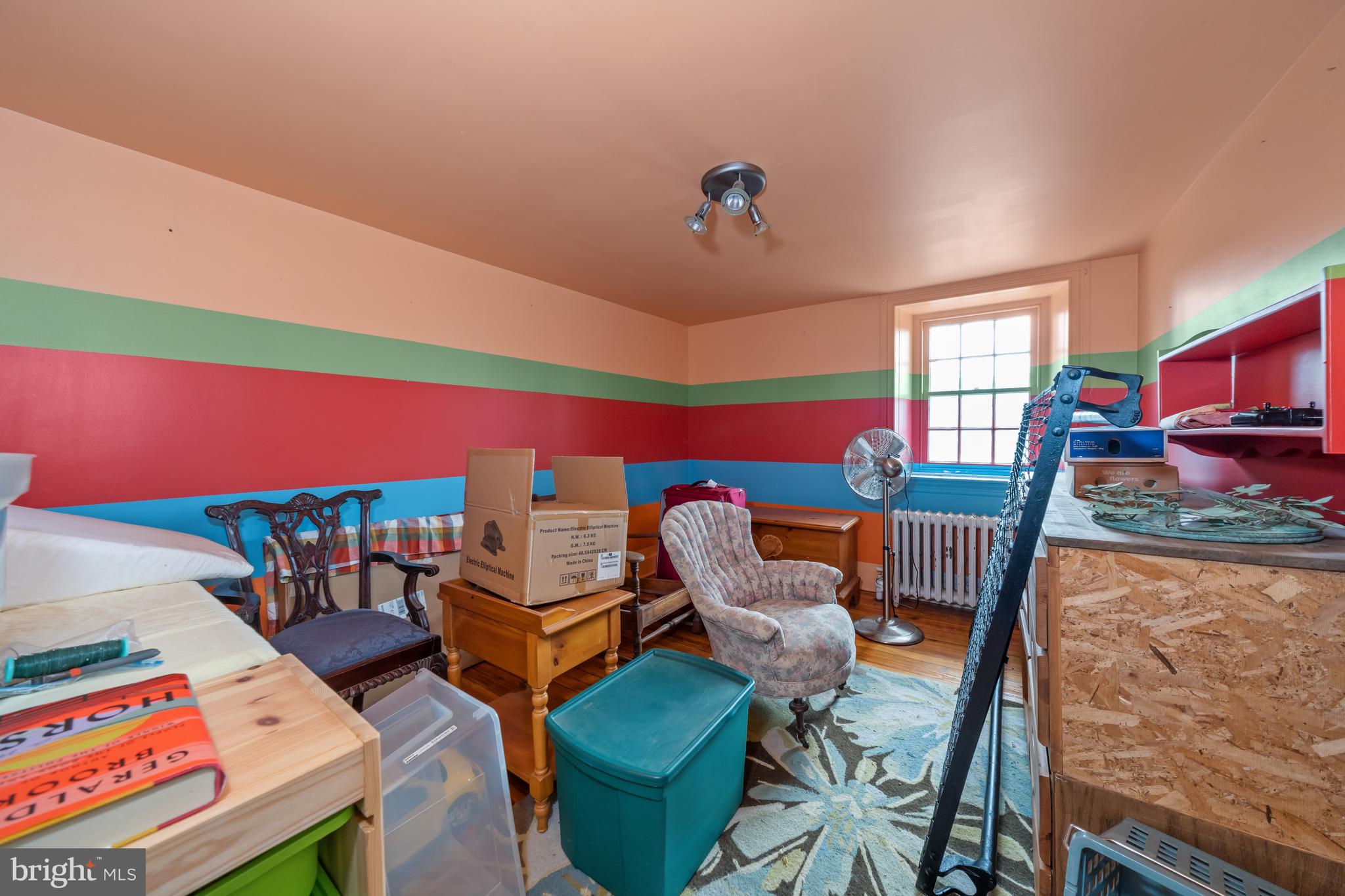 3934 Thompsons Bridge Road Wilmington, DE 19807 - Photo 12 of 28 a living room with furniture a rug and a window