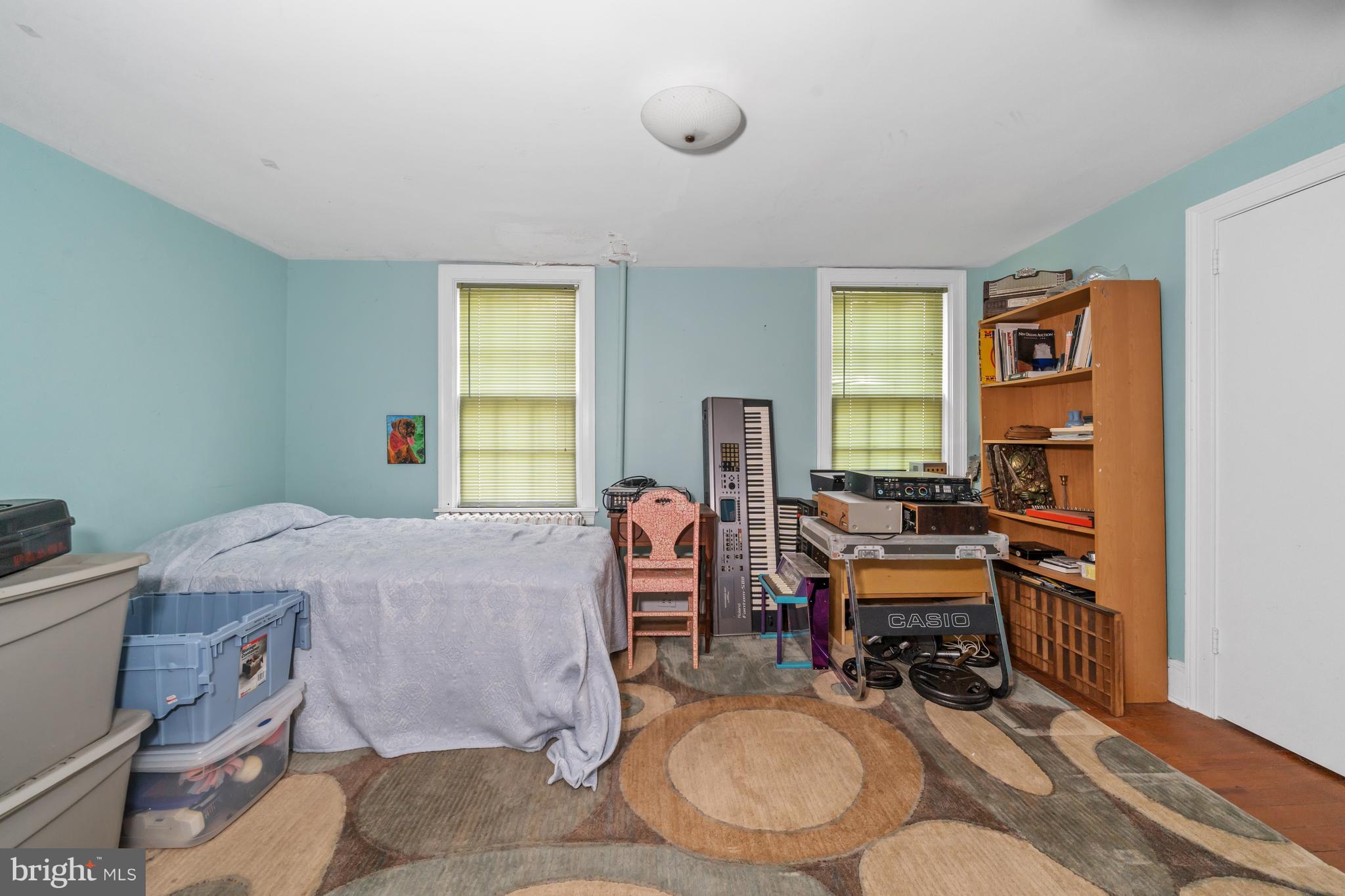 3934 Thompsons Bridge Road Wilmington, DE 19807 - Photo 16 of 28 a bedroom with furniture and a window