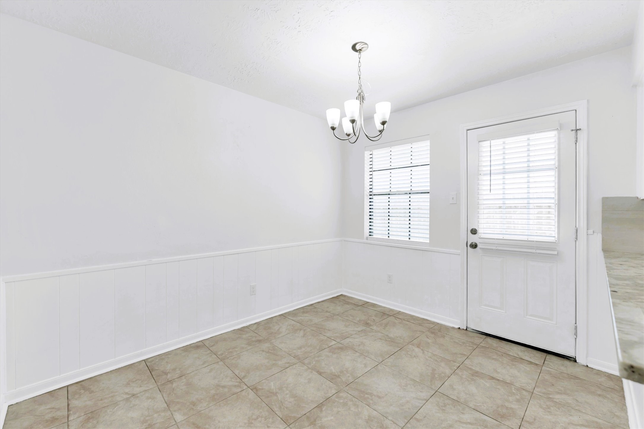 1101 Wilson Drive Rosenberg, TX 77471 - Photo 8 of 38 DINING ROOM 8.9X10.7 WITH CHAIR RAILING & 2" BLINDS!