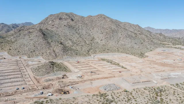 a view of mountain view with mountains in the background