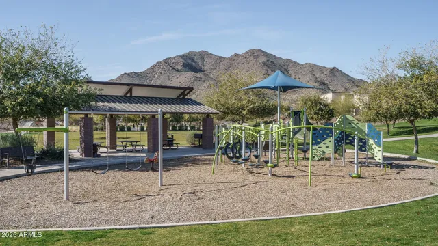 a view of a house with backyard and porch