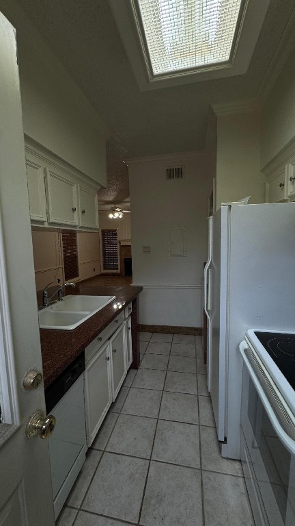 3600 Jeanetta Street, Unit 1301 Houston, TX 77063 - Photo 12 of 21 a kitchen with a stove and a refrigerator