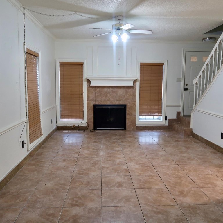 3600 Jeanetta Street, Unit 1301 Houston, TX 77063 - Photo 4 of 21 a view of empty room with fireplace
