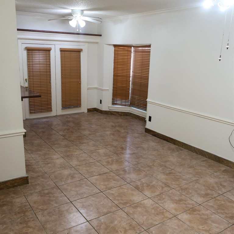 3600 Jeanetta Street, Unit 1301 Houston, TX 77063 - Photo 5 of 21 an empty room with windows