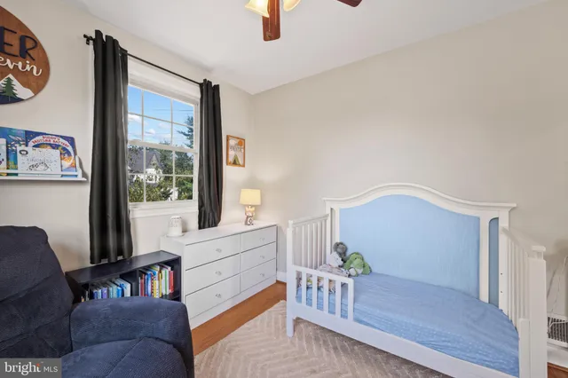 a view of a livingroom with an empty space and a flat screen tv