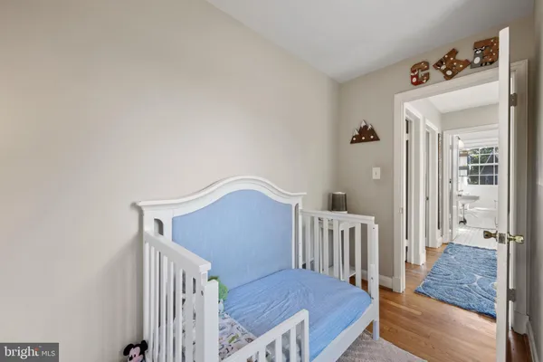 a view of a livingroom with furniture and staircase
