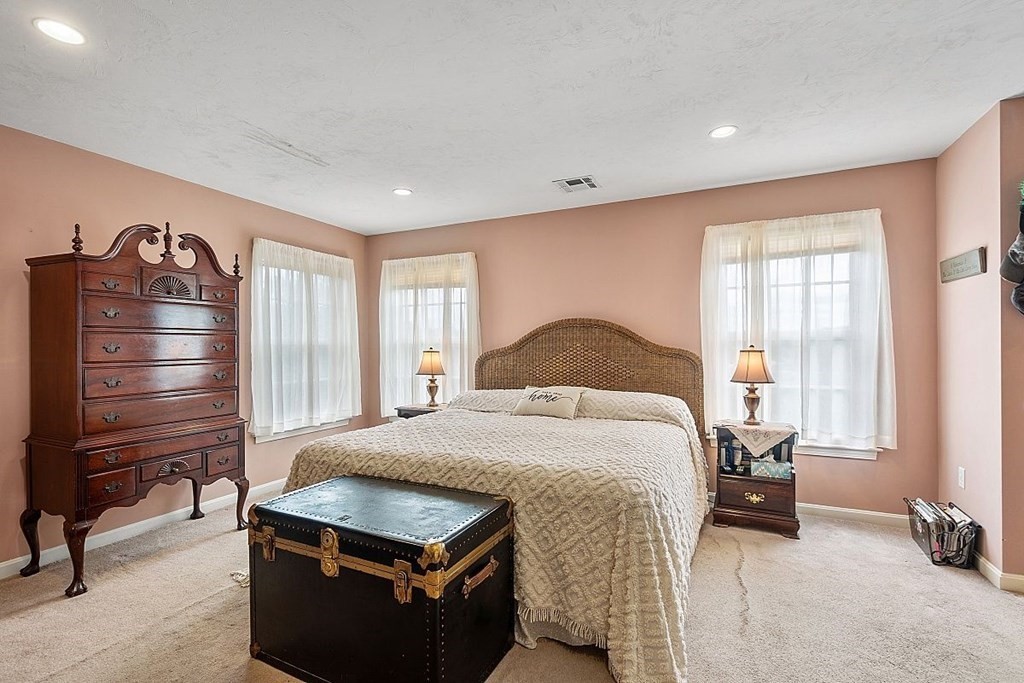 299 South Meadow Road Lancaster, MA 01523 - Photo 29 of 41 a bedroom with a bed and window