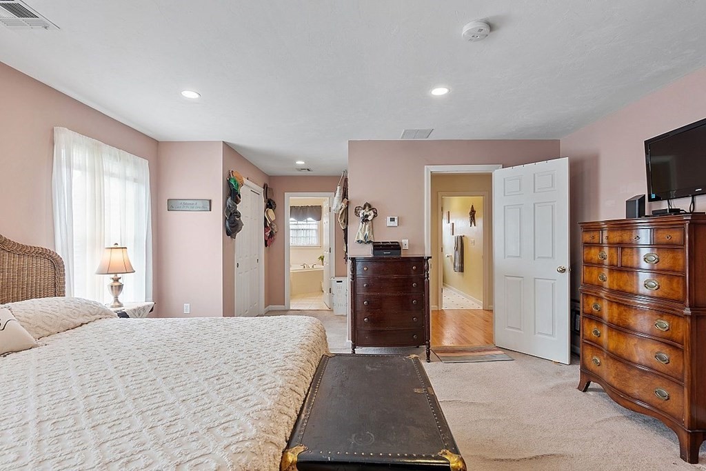 299 South Meadow Road Lancaster, MA 01523 - Photo 31 of 41 a bedroom with a bed and furniture