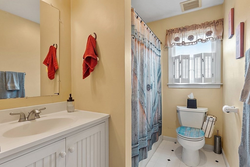 299 South Meadow Road Lancaster, MA 01523 - Photo 37 of 41 a bathroom with a sink toilet and shower