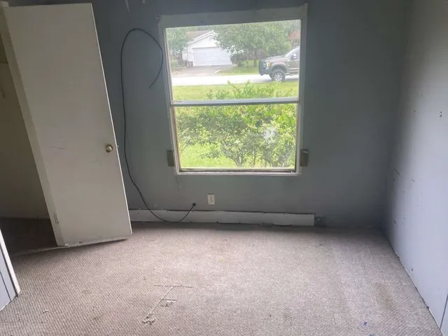 an empty room with a window