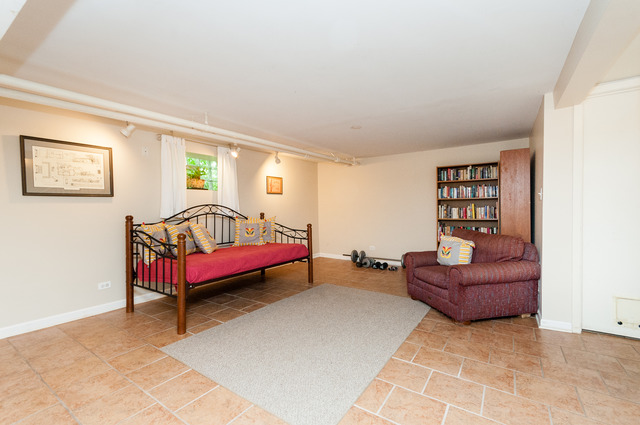 511 Lathrop Avenue River Forest, IL 60305 - Photo 22 of 25 a bedroom with furniture and window