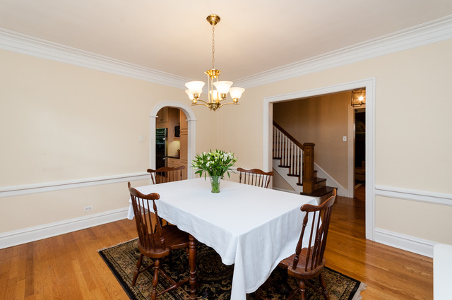 511 Lathrop Avenue River Forest, IL 60305 - Photo 8 of 25 a view of a dining room with furniture and wooden floor