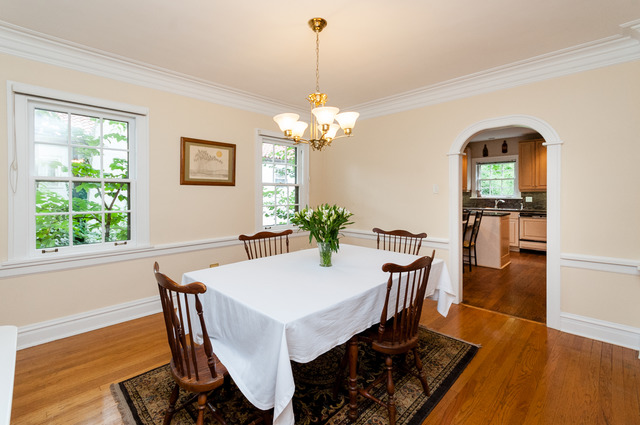 511 Lathrop Avenue River Forest, IL 60305 - Photo 9 of 25 a dining room with furniture a window and wooden floor