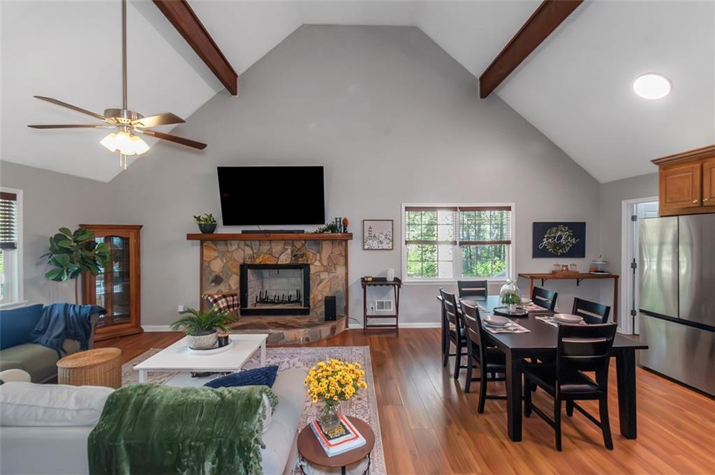 150 Mackey Road McDonough, GA 30252 - Photo 11 of 38 a living room with fireplace furniture and a flat screen tv