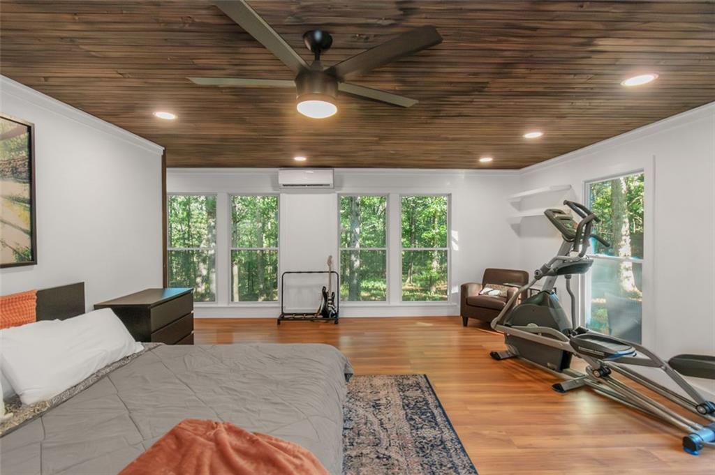 150 Mackey Road McDonough, GA 30252 - Photo 23 of 38 a living room with furniture floor to ceiling window and a table
