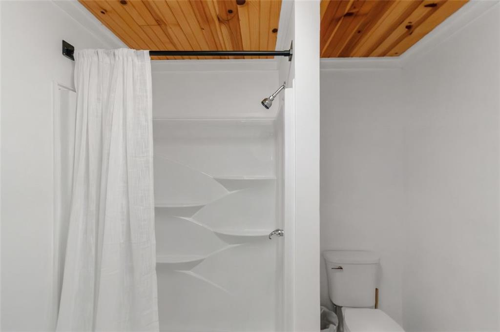 150 Mackey Road McDonough, GA 30252 - Photo 25 of 38 a bathroom with a shower and a toilet