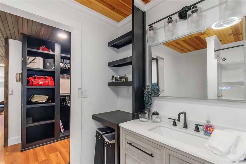 150 Mackey Road McDonough, GA 30252 - Photo 26 of 38 a bathroom with a sink and a mirror