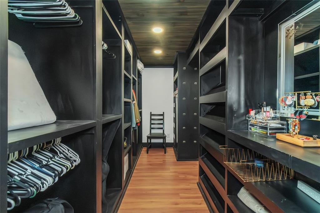 150 Mackey Road McDonough, GA 30252 - Photo 27 of 38 a hallway with chairs and wooden floor