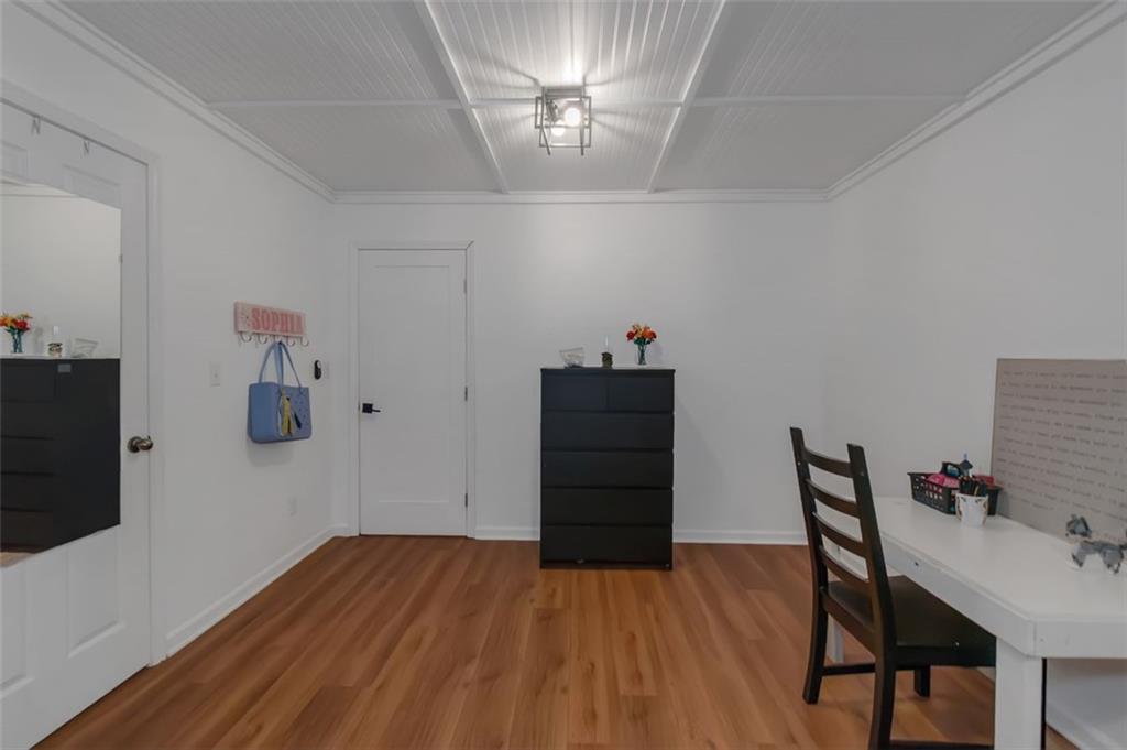 150 Mackey Road McDonough, GA 30252 - Photo 30 of 38 a workspace with furniture and wooden floor