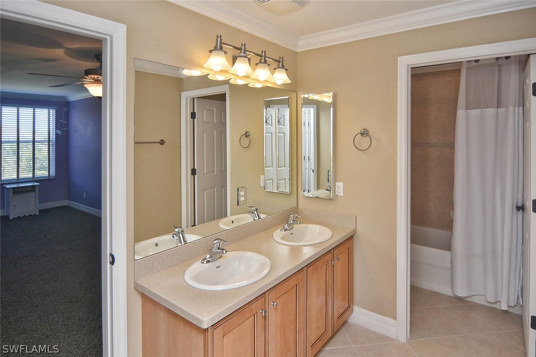 12357 Rock Ridge Lane Fort Myers, FL 33913 - Photo 11 of 25 a bathroom with a sink double vanity and a mirror