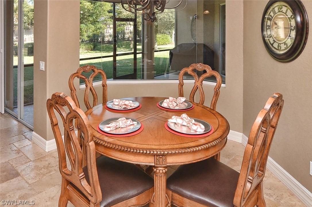 12357 Rock Ridge Lane Fort Myers, FL 33913 - Photo 21 of 25 a view of a dining room with furniture window and outside view