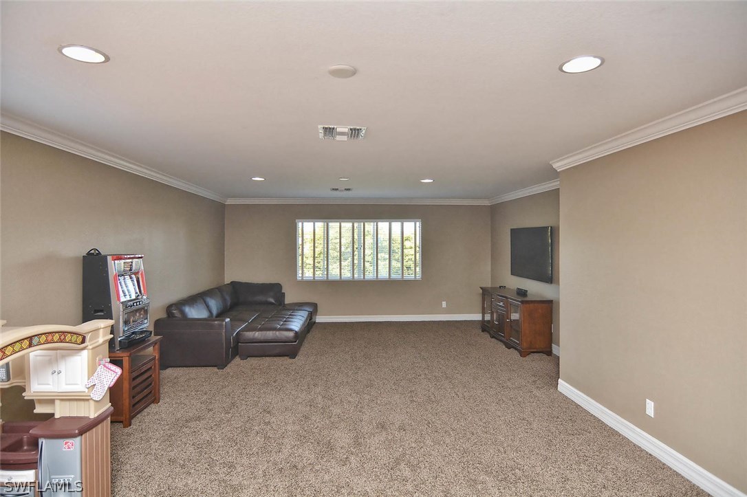 12357 Rock Ridge Lane Fort Myers, FL 33913 - Photo 6 of 25 a living room with furniture and a window