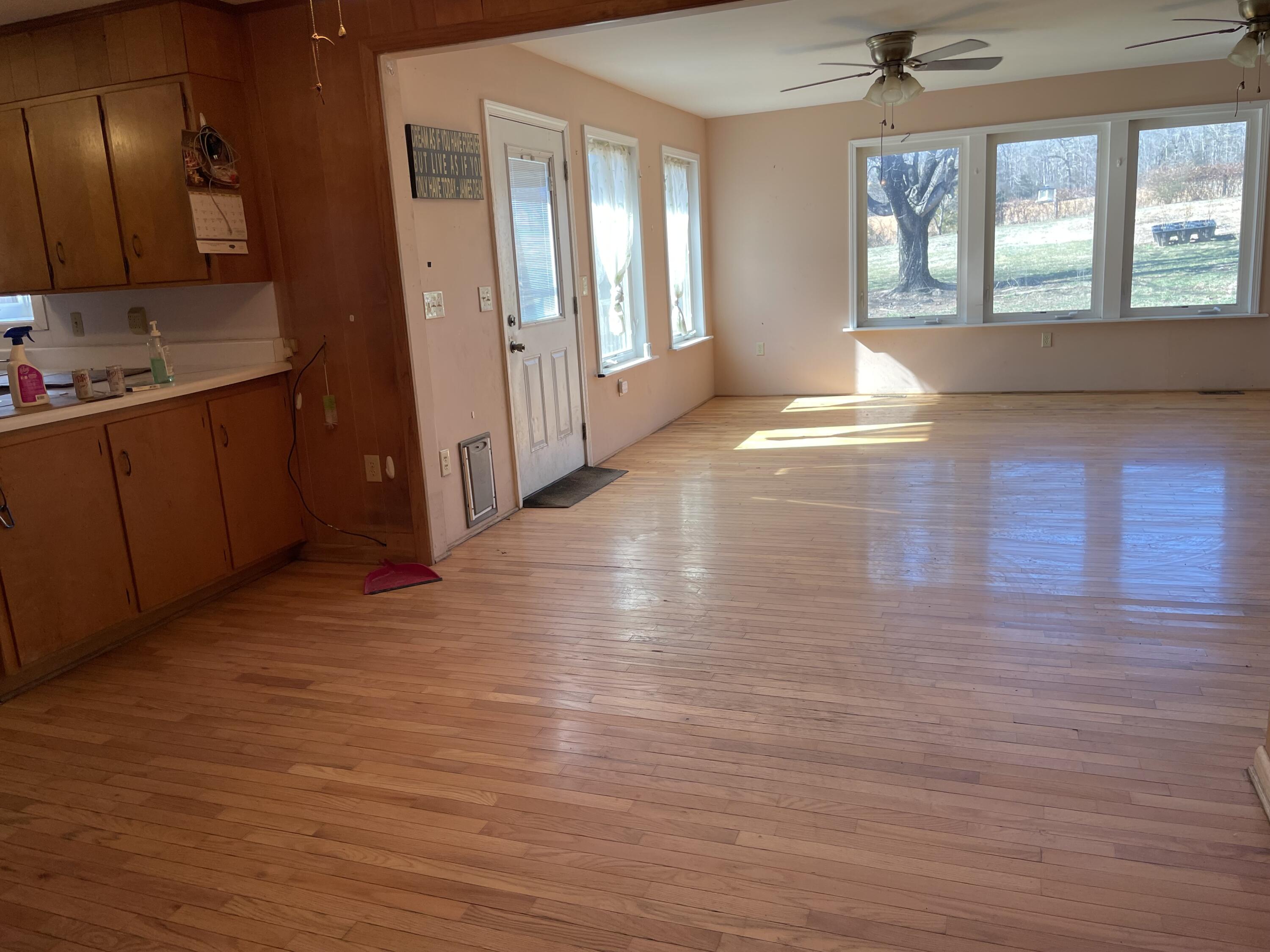 2047 Botetourt Road Fincastle, VA 24090 - Photo 6 of 11 a view of an empty room with window and wooden floor