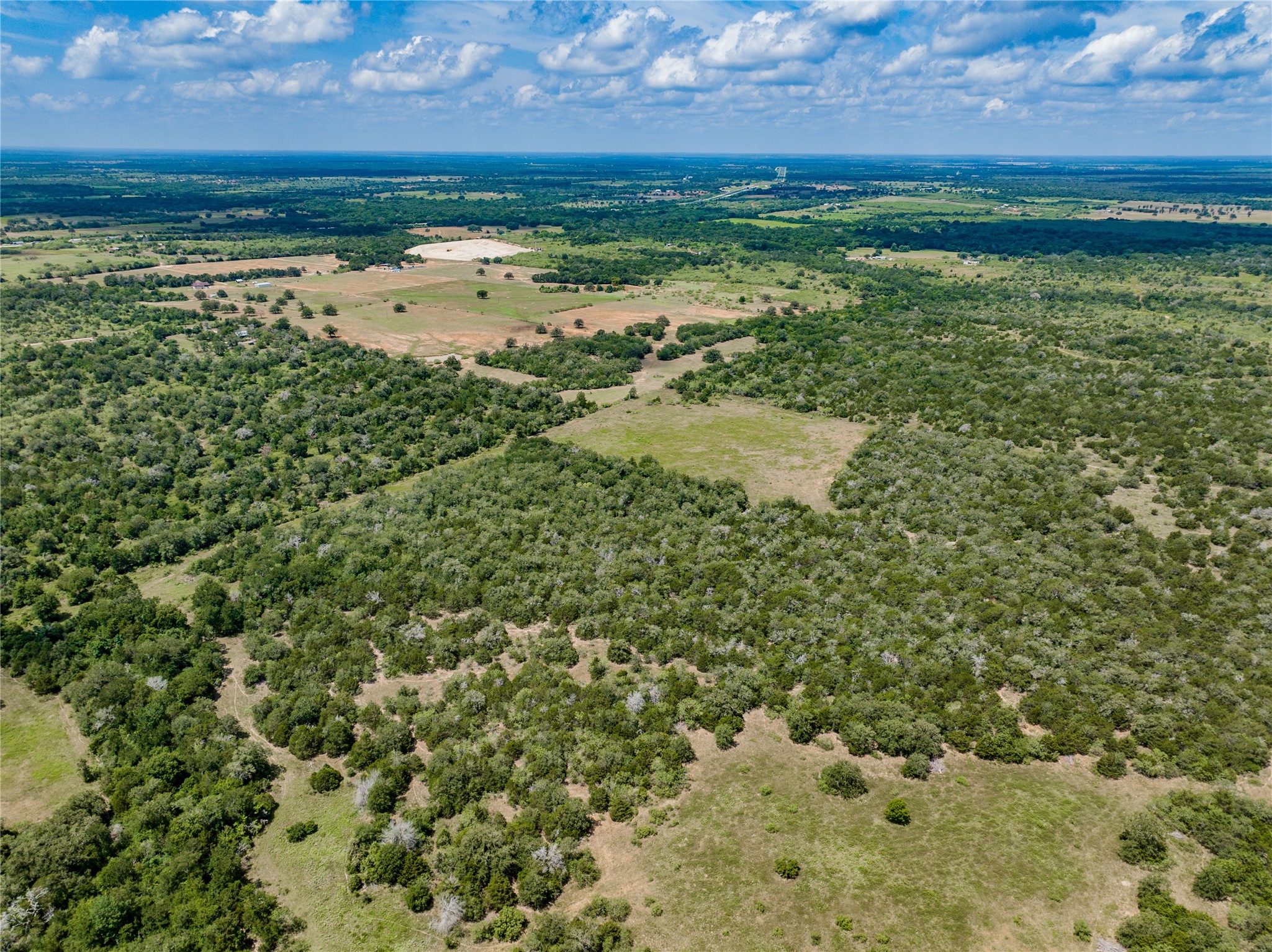 13 Armstrong Road Waelder, TX 78959 - Photo 4 of 6 a view of a field with an outdoor space