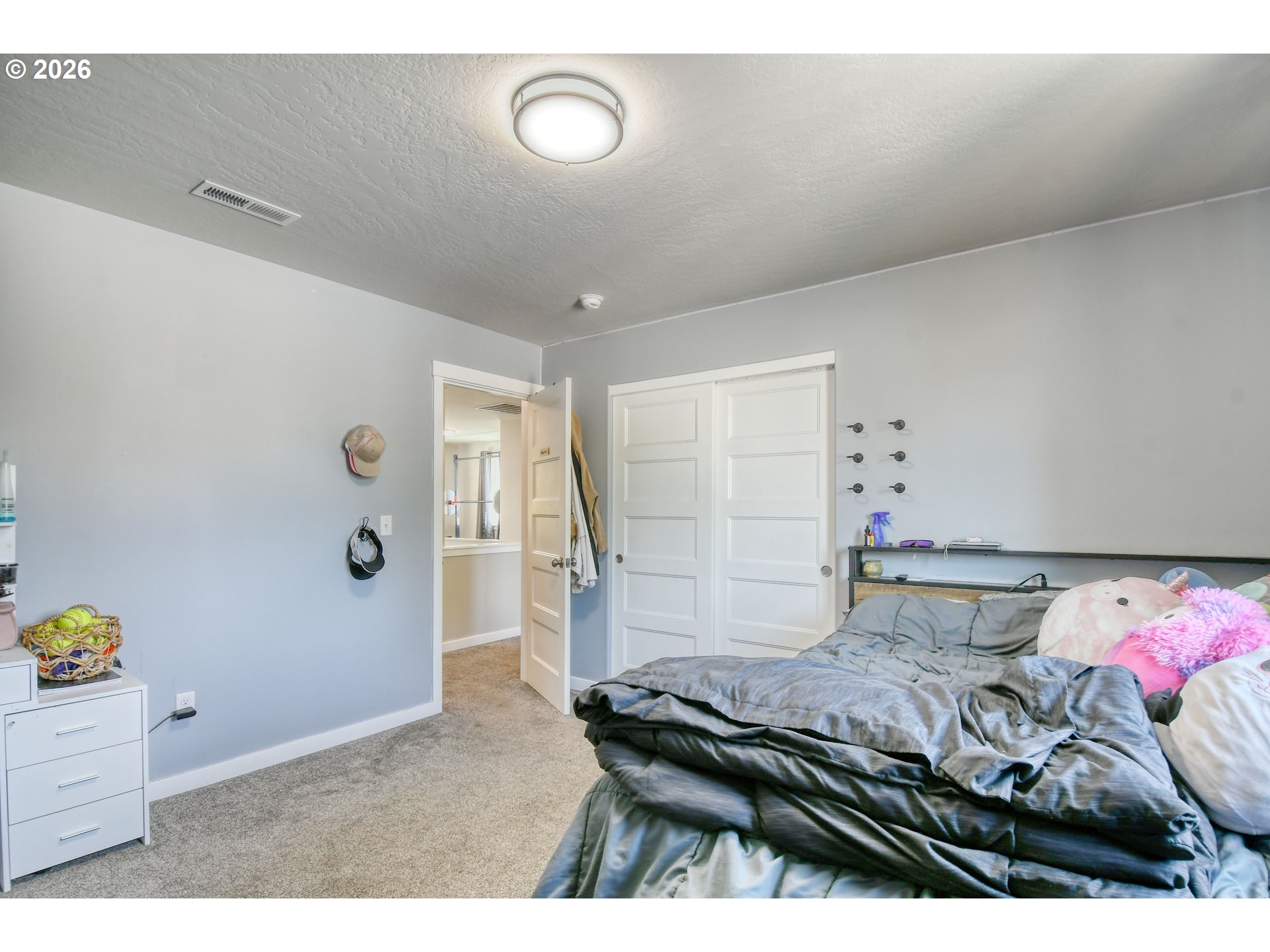233 East Jefferson Street Athena, OR 97813 - Photo 24 of 36 a bedroom with a bed and a window