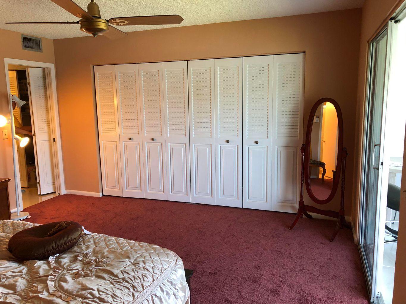 2059 Ainslie Drive, Unit D Boca Raton, FL 33434 - Photo 13 of 18 master closet