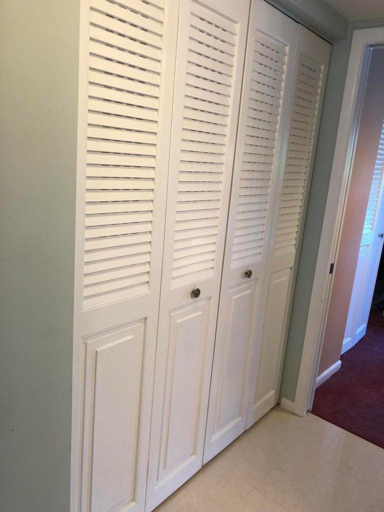 2059 Ainslie Drive, Unit D Boca Raton, FL 33434 - Photo 9 of 18 hallway closet