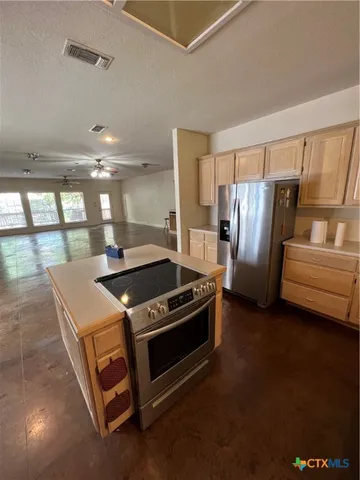a bathroom with a sink vanity and a mirror