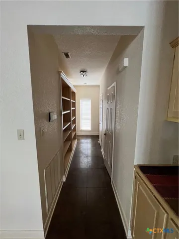 a bathroom with a sink a vanity and mirror