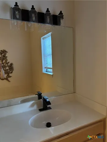 a view of balcony with wooden floor and outdoor seating