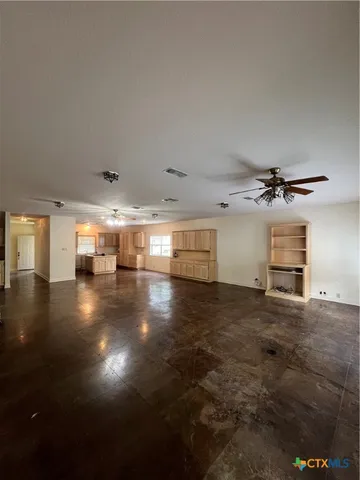 a close view of a sink and a toilet in bathroom