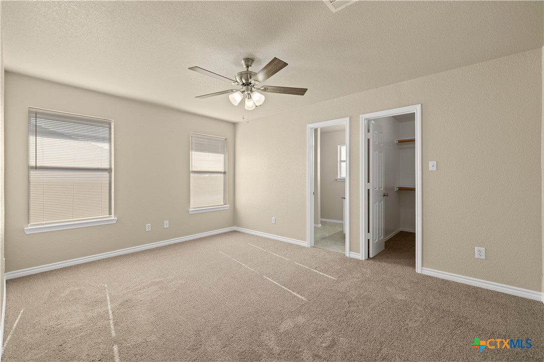 217 Timber Ridge Drive Nolanville, TX 76559 - Photo 12 of 25 a view of empty room with window and ceiling fan