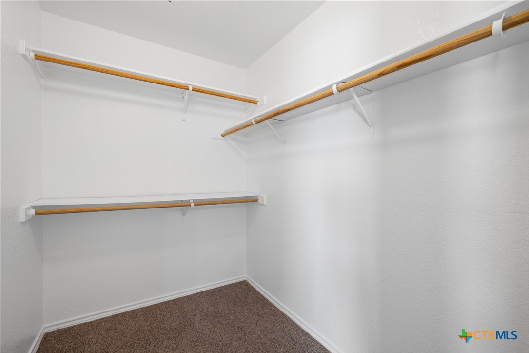 217 Timber Ridge Drive Nolanville, TX 76559 - Photo 14 of 25 a view of small space with racks on the wall