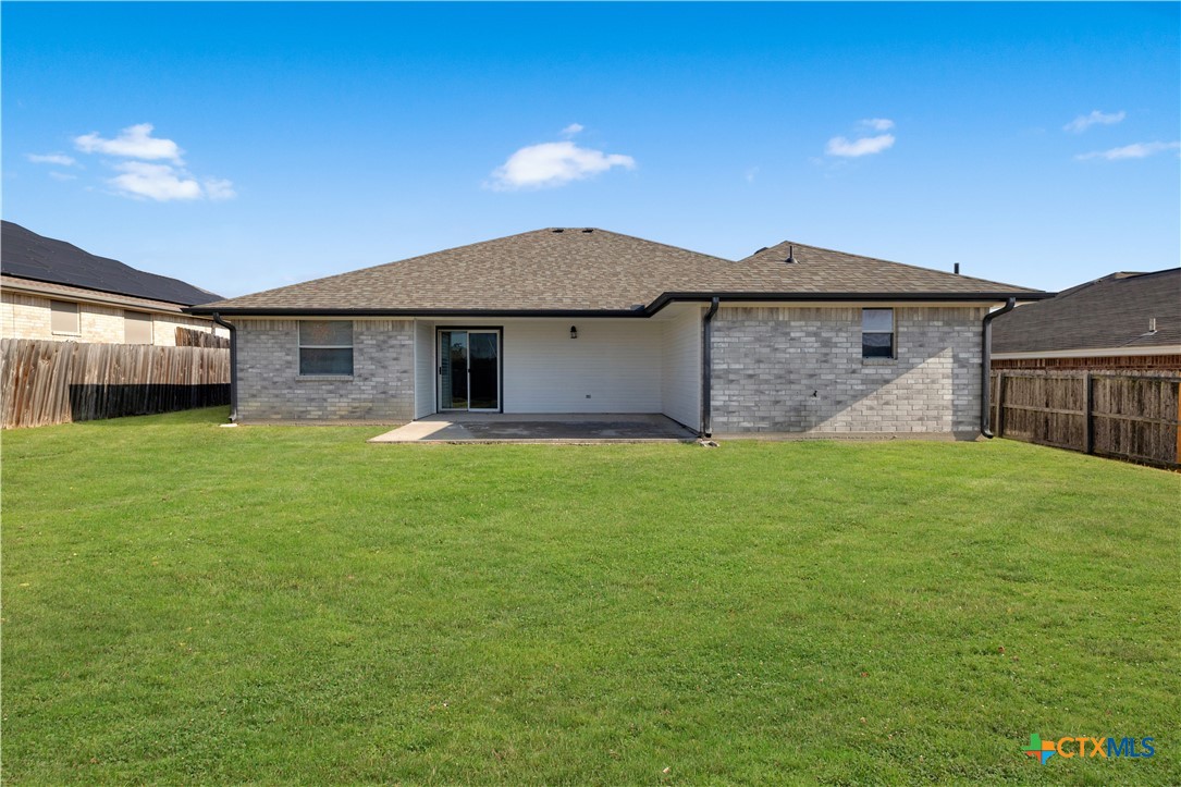217 Timber Ridge Drive Nolanville, TX 76559 - Photo 24 of 25 a front view of a house with a garden