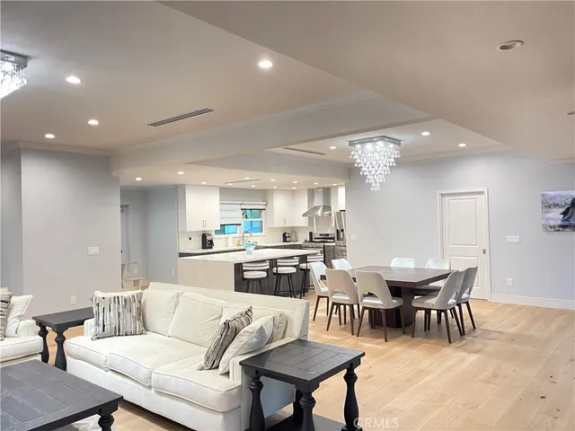 a view of kitchen with dining table and chairs