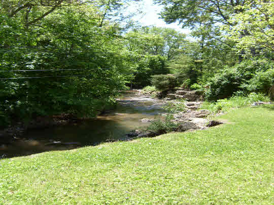 3117 Spring Creek Road Rockford, IL 61107 - Photo 11 of 11 a view of a lake from a yard
